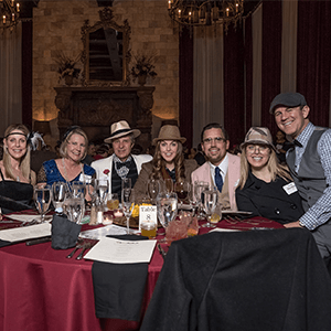 St Louis Murder Mystery party guests at the table