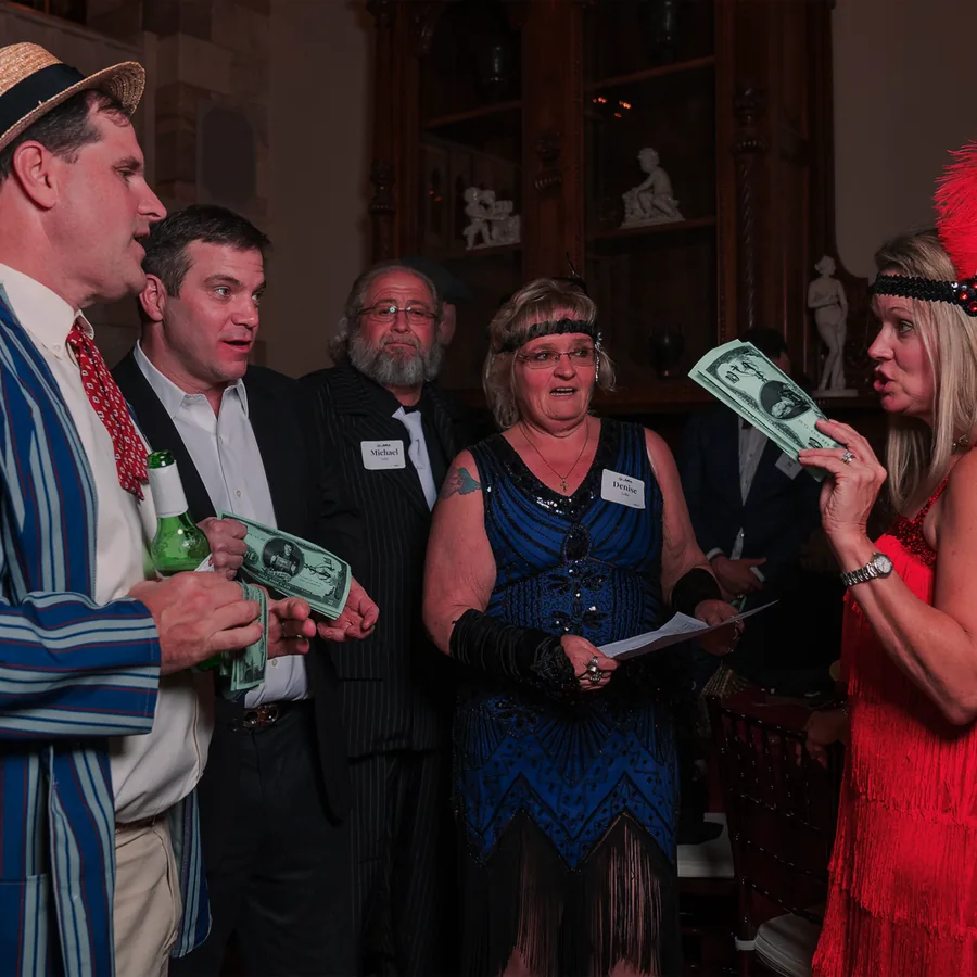 Guests at a Murder Mystery Company public dinner show in St. Louis