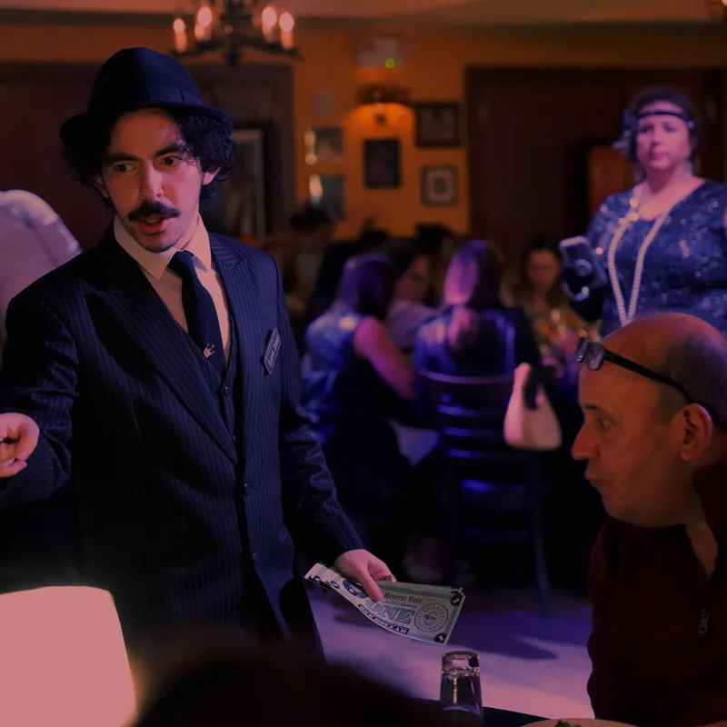 A detective questioning a guest at a St. Louis show