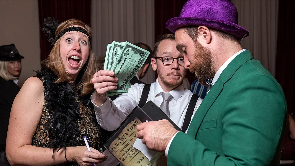 Guests enjoying a St. Louis murder mystery party